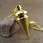 Pendule conique en métal doré