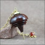 Pendule bois précieux Sensorium