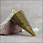 Pendule facetté oeil de Tigre