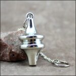 Pendule NSP laiton chromé