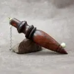 Pendule bois style égyptien