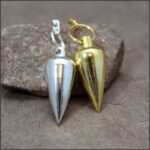 Pendule métal conique débutant