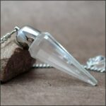 Pendule cristal de roche dôme acier