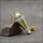 Pendule pointe témoin strié