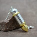 Pendule divinatoire balle métal témoin