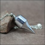 Pendule pointe laiton chromé