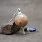 Pendule séphoroton pierre de lune rose