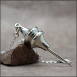 Pendule cartographe laiton