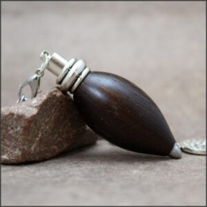 pendule artisanal bois de fer